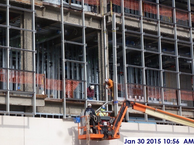 Installing curtain wall returns at the South Elevation 1